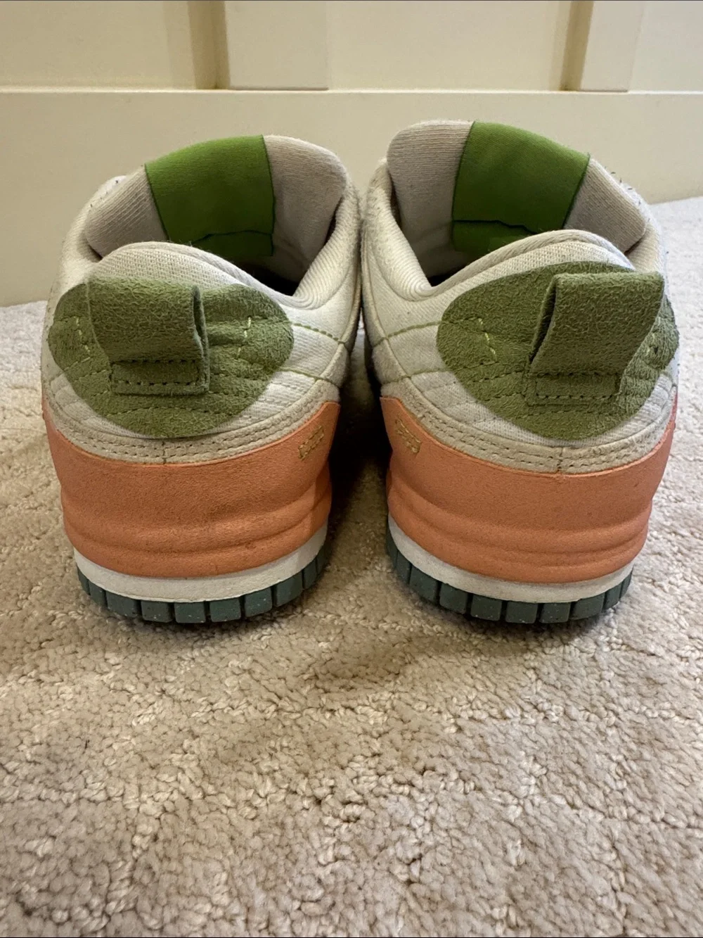 Nike Low-Top Sneakers in White with Green, Blue, and Orange Accents